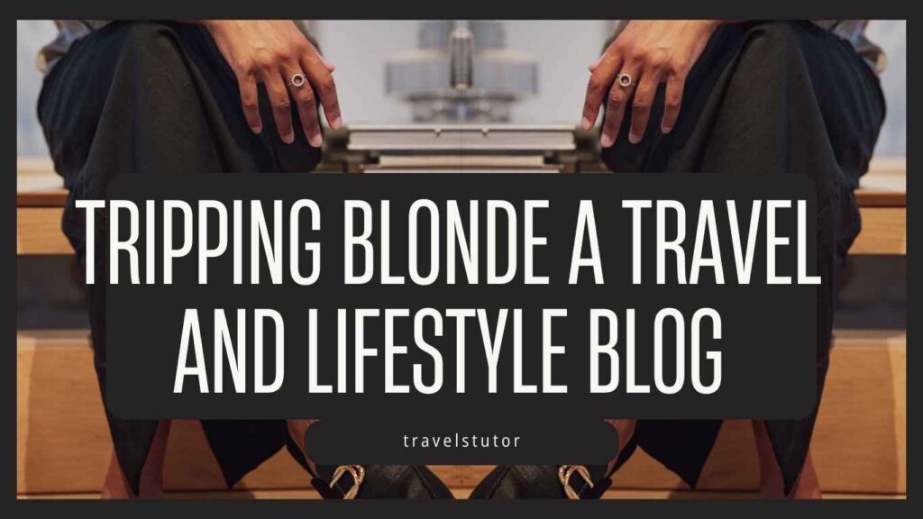 Two hands resting on knees with an overlay of text: TRIPPING BLONDE A TRAVEL AND LIFESTYLE BLOG and traveltutor below. The background shows a blurred interior setting.