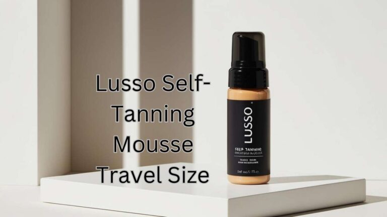 A bottle of Lusso Self-Tanning Mousse Travel Size is placed on a white platform. The bottle is black with a pump top and tan product visible. Text on the left reads Lusso Self-Tanning Mousse Travel Size.